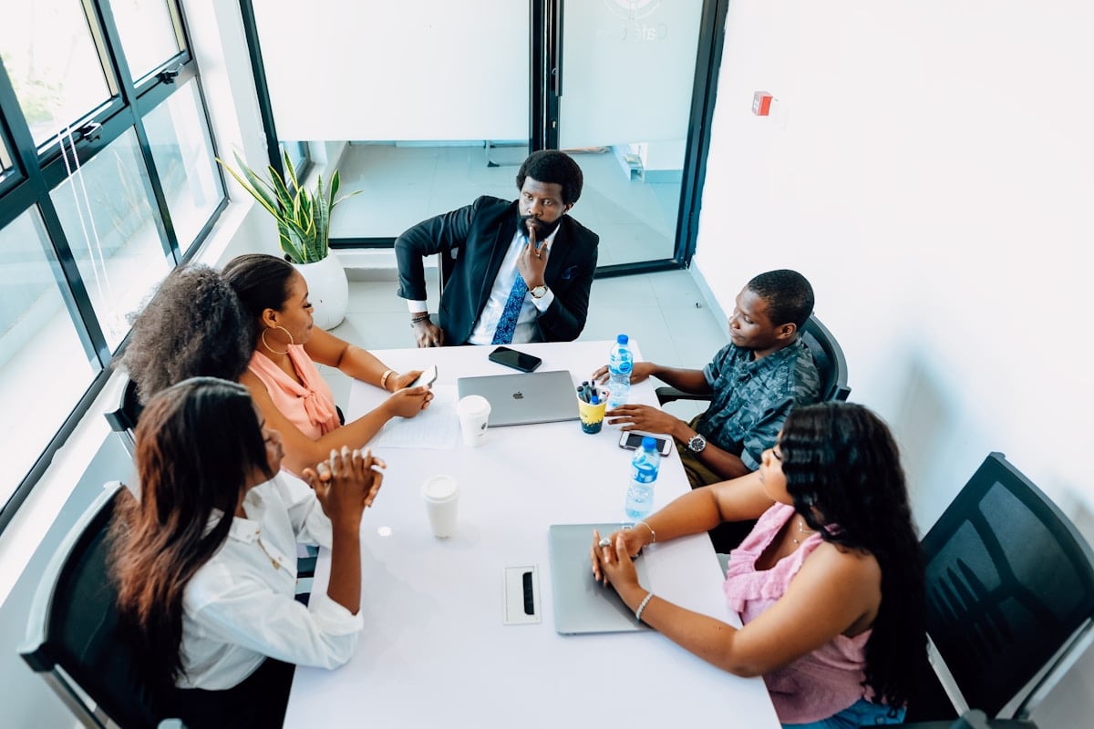 Nigerian business team in a strategy meeting — Planexi consulting